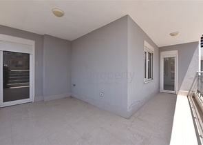 Трехкомнатная квартира в районе Махмутлар