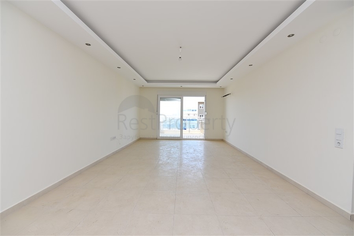 Двухкомнатная квартира в районе Махмутлар