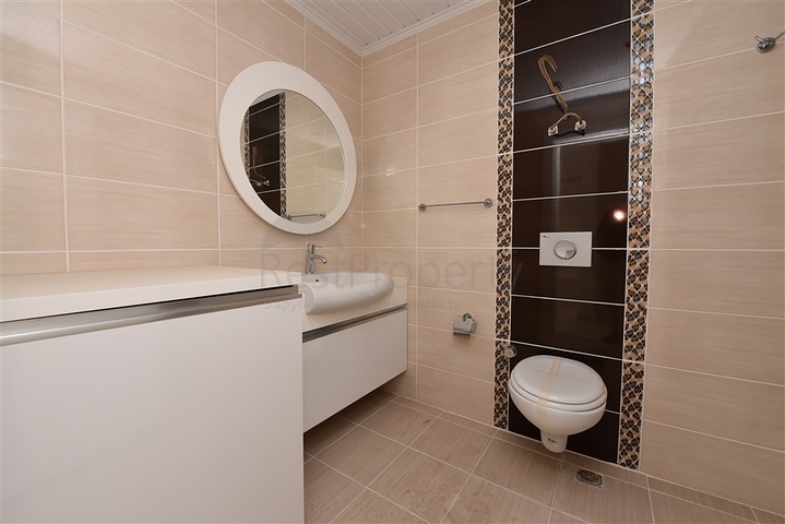 Двухкомнатная квартира в районе Махмутлар