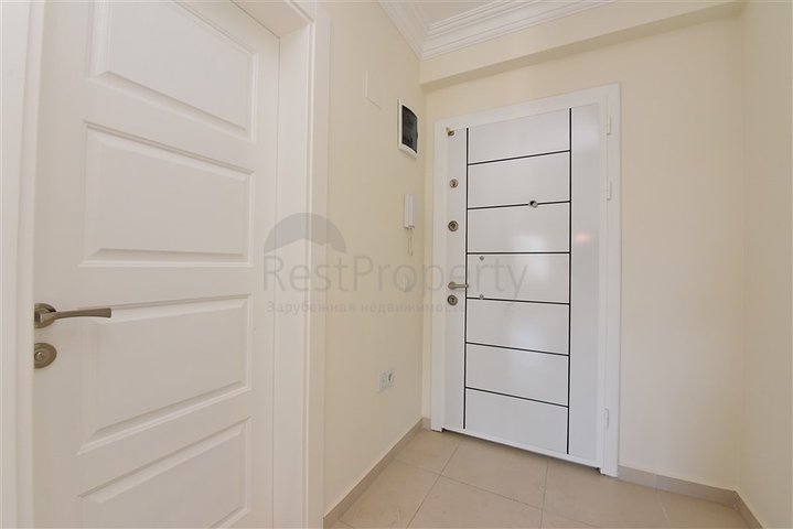 Двухкомнатная квартира в районе Махмутлар