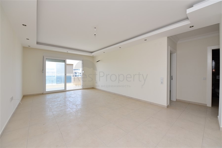 Двухкомнатная квартира в районе Махмутлар