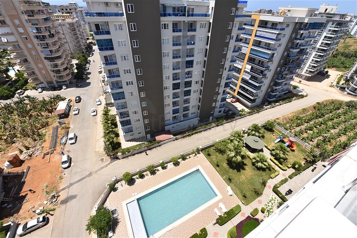 Двухкомнатная квартира в районе Махмутлар