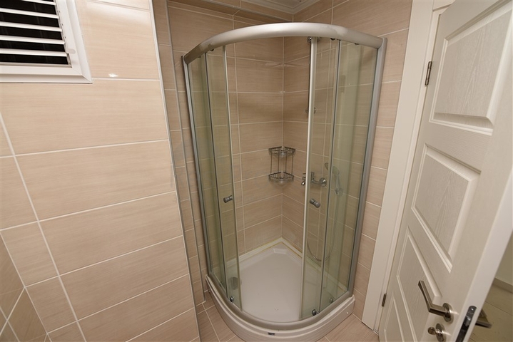 Двухкомнатная квартира в районе Махмутлар