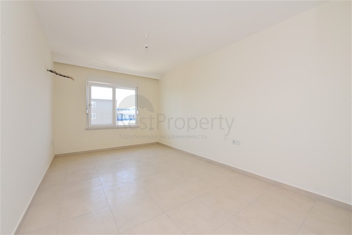 Двухкомнатная квартира в районе Махмутлар