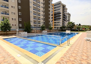 Двухкомнатная квартира в районе Махмутлар