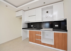 Двухкомнатная квартира в районе Махмутлар