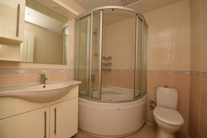 Трехкомнатная квартира в районе Махмутлар