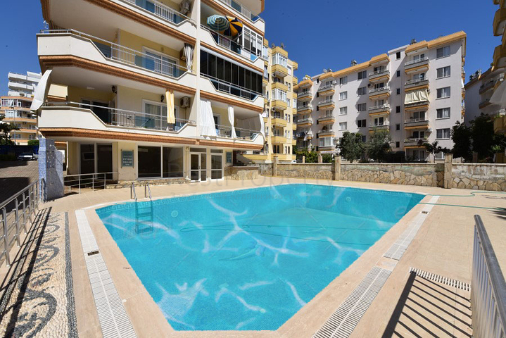 Трехкомнатная квартира в районе Махмутлар