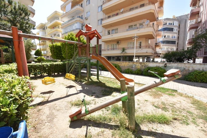 Трехкомнатная квартира в районе Махмутлар