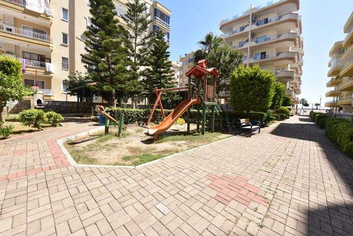 Трехкомнатная квартира в районе Махмутлар