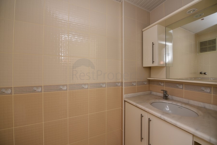 Трехкомнатная квартира в районе Махмутлар