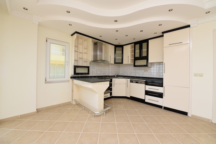 Трехкомнатная квартира в районе Махмутлар