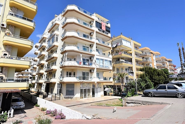 Трехкомнатная квартира в районе Махмутлар