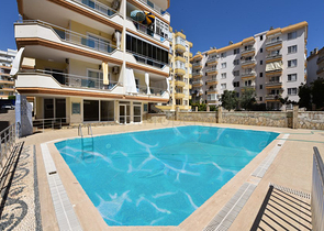 Трехкомнатная квартира в районе Махмутлар