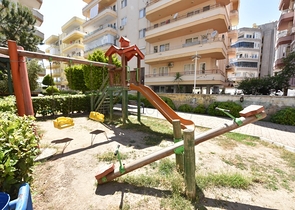 Трехкомнатная квартира в районе Махмутлар