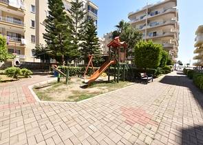 Трехкомнатная квартира в районе Махмутлар