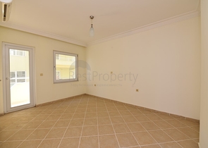 Трехкомнатная квартира в районе Махмутлар