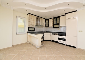 Трехкомнатная квартира в районе Махмутлар