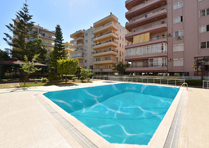 Трехкомнатная квартира в районе Махмутлар