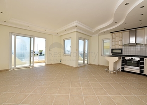 Трехкомнатная квартира в районе Махмутлар