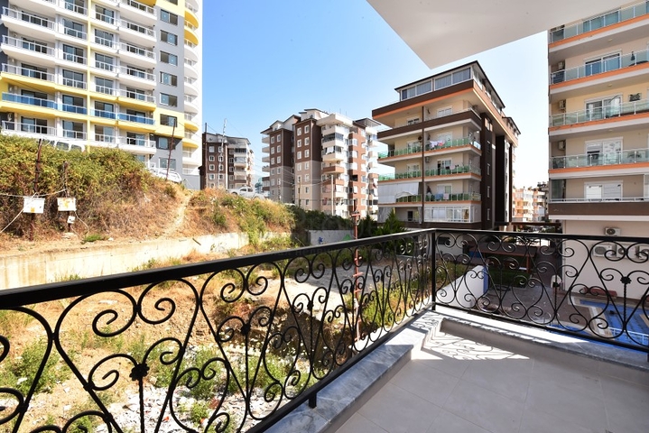 Двухкомнатная квартира с мебелью на аренду в Махмутларе