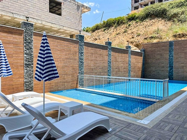 Двухкомнатная квартира с мебелью на аренду в Махмутларе