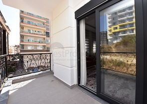 Двухкомнатная квартира с мебелью на аренду в Махмутларе