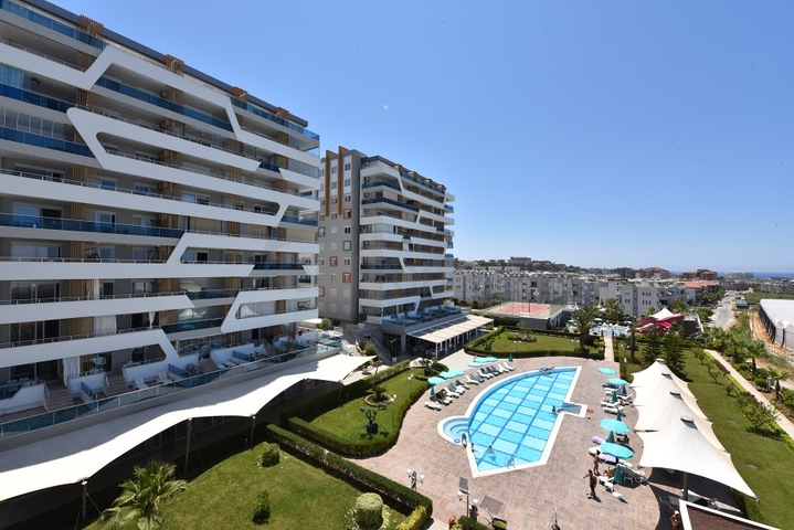 Меблированная квартира планировки 1+1 в районе Авсаллар