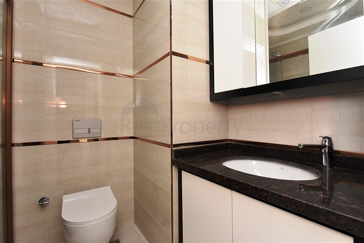 Двухкомнатная квартира в районе Махмутлар