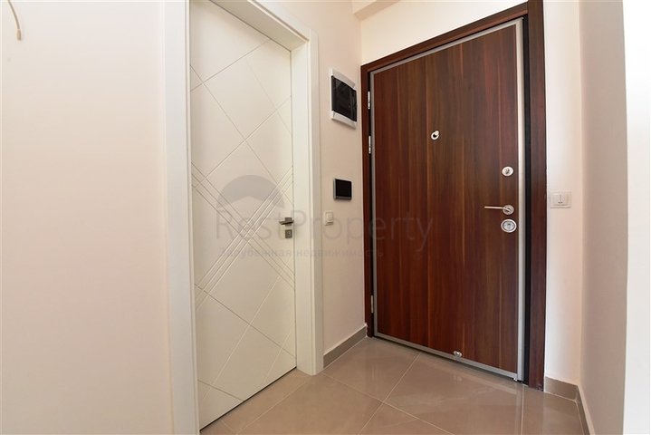 Двухкомнатная квартира в районе Махмутлар