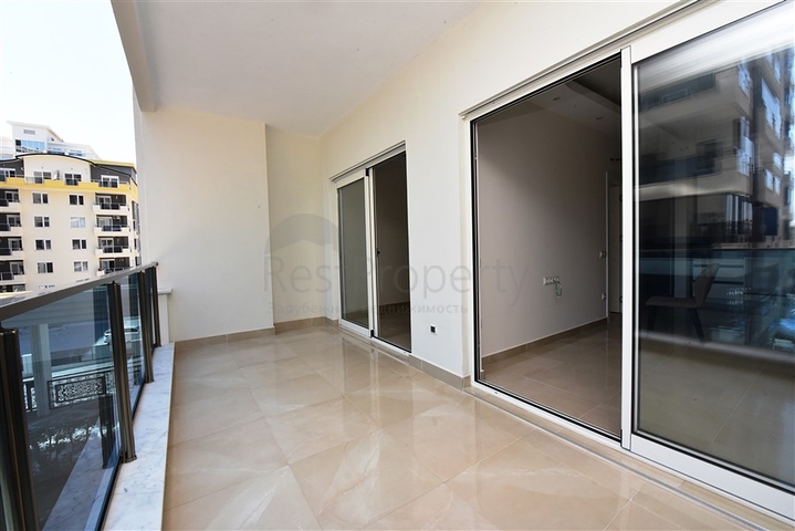 Двухкомнатная квартира в районе Махмутлар