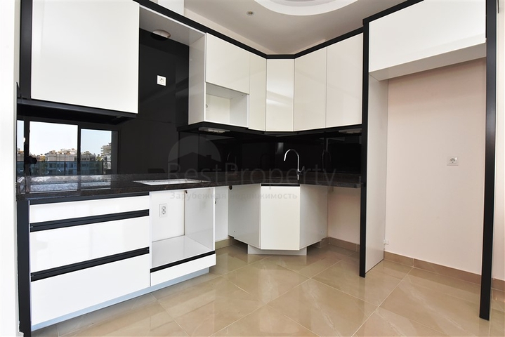 Двухкомнатная квартира в районе Махмутлар