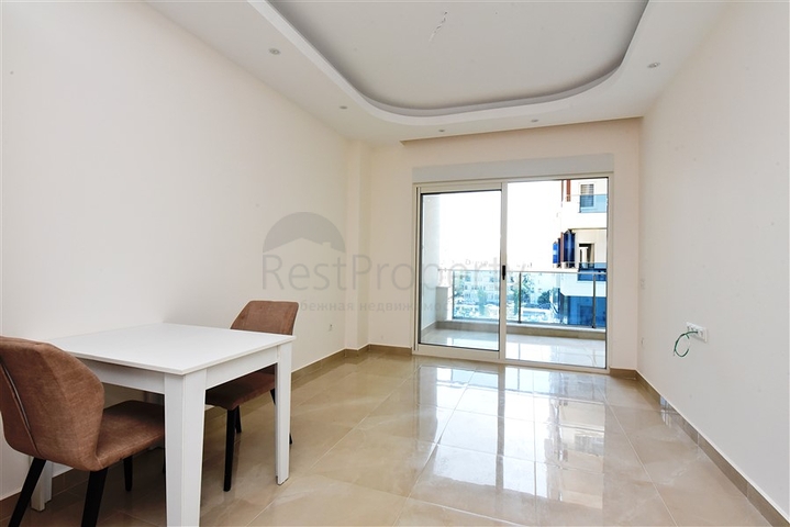 Двухкомнатная квартира в районе Махмутлар