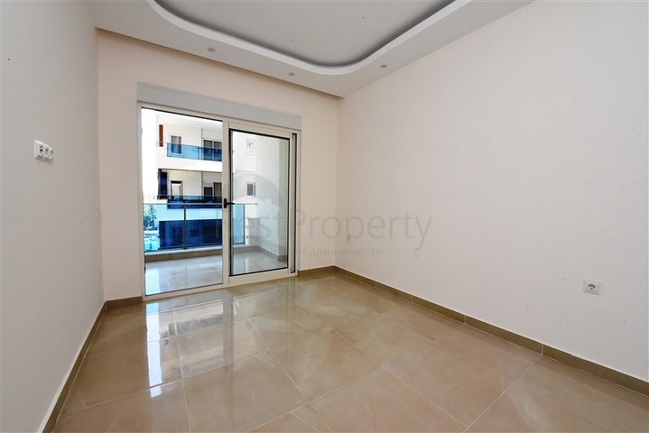 Двухкомнатная квартира в районе Махмутлар