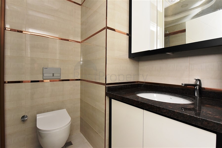 Двухкомнатная квартира в районе Махмутлар