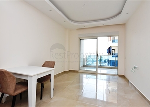 Двухкомнатная квартира в районе Махмутлар