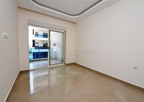 Двухкомнатная квартира в районе Махмутлар