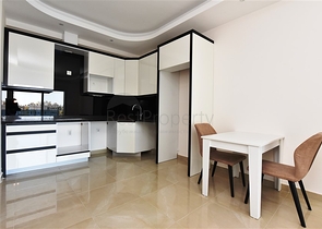 Двухкомнатная квартира в районе Махмутлар