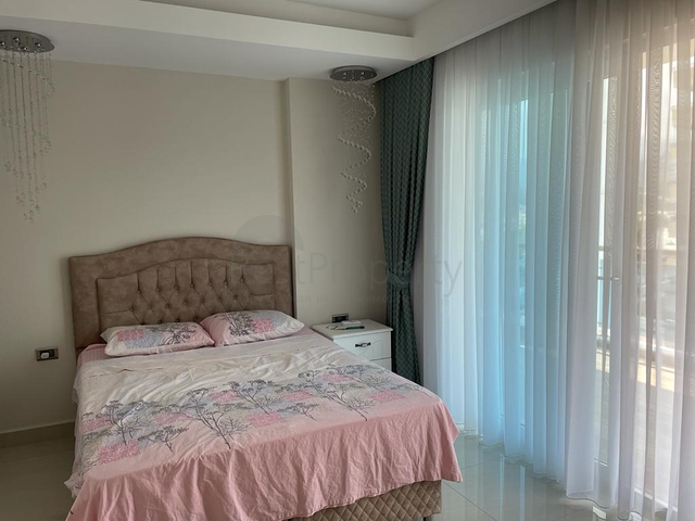 Меблированная квартира планировки 1+1 в ЖК района Махмутлар