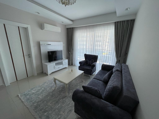 Меблированная квартира планировки 1+1 в ЖК района Махмутлар