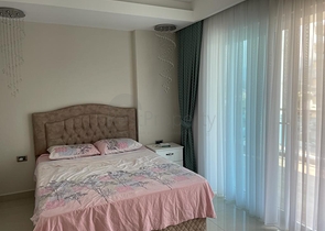 Меблированная квартира планировки 1+1 в ЖК района Махмутлар