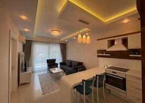 Меблированная квартира планировки 1+1 в ЖК района Махмутлар