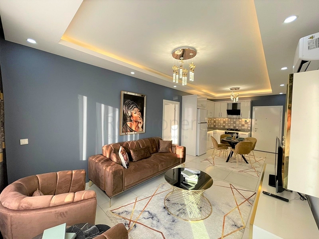 Трехкомнатная квартира в районе Махмутлар