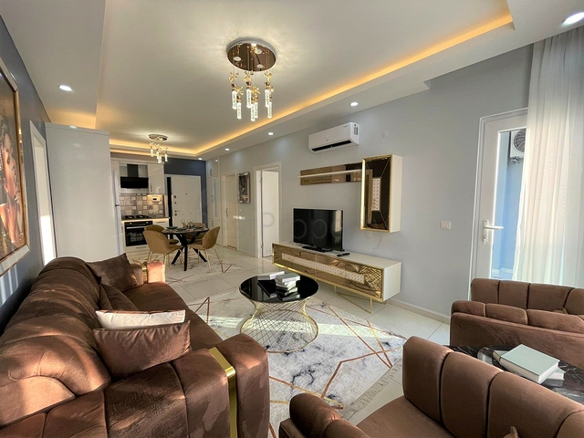 Трехкомнатная квартира в районе Махмутлар