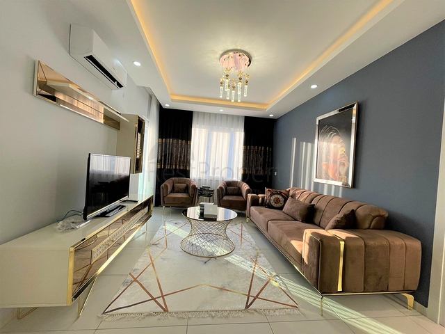 Трехкомнатная квартира в районе Махмутлар