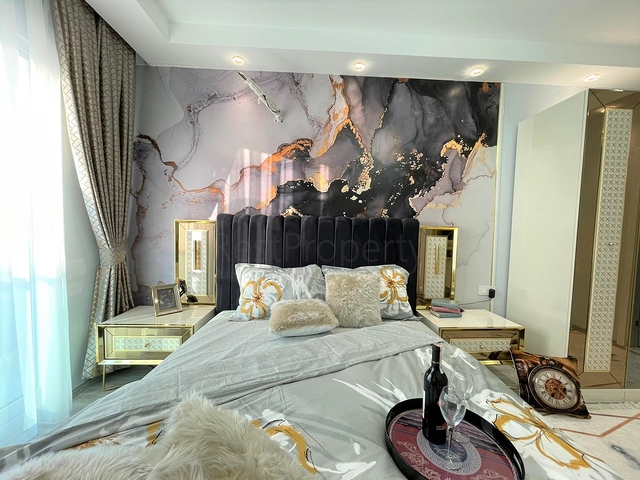 Трехкомнатная квартира в районе Махмутлар