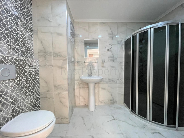 Трехкомнатная квартира в районе Махмутлар