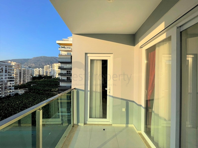 Трехкомнатная квартира в районе Махмутлар