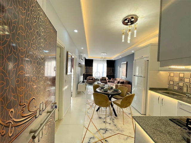 Трехкомнатная квартира в районе Махмутлар