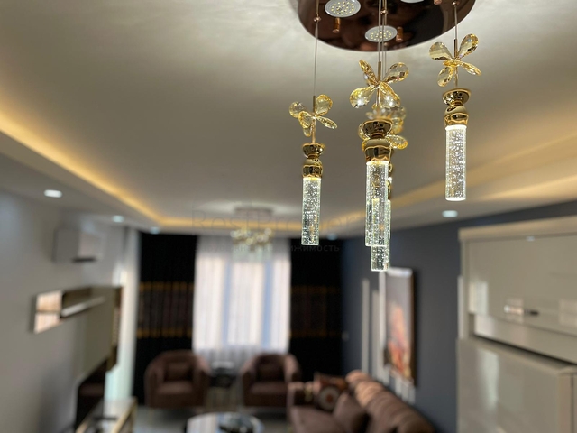 Трехкомнатная квартира в районе Махмутлар